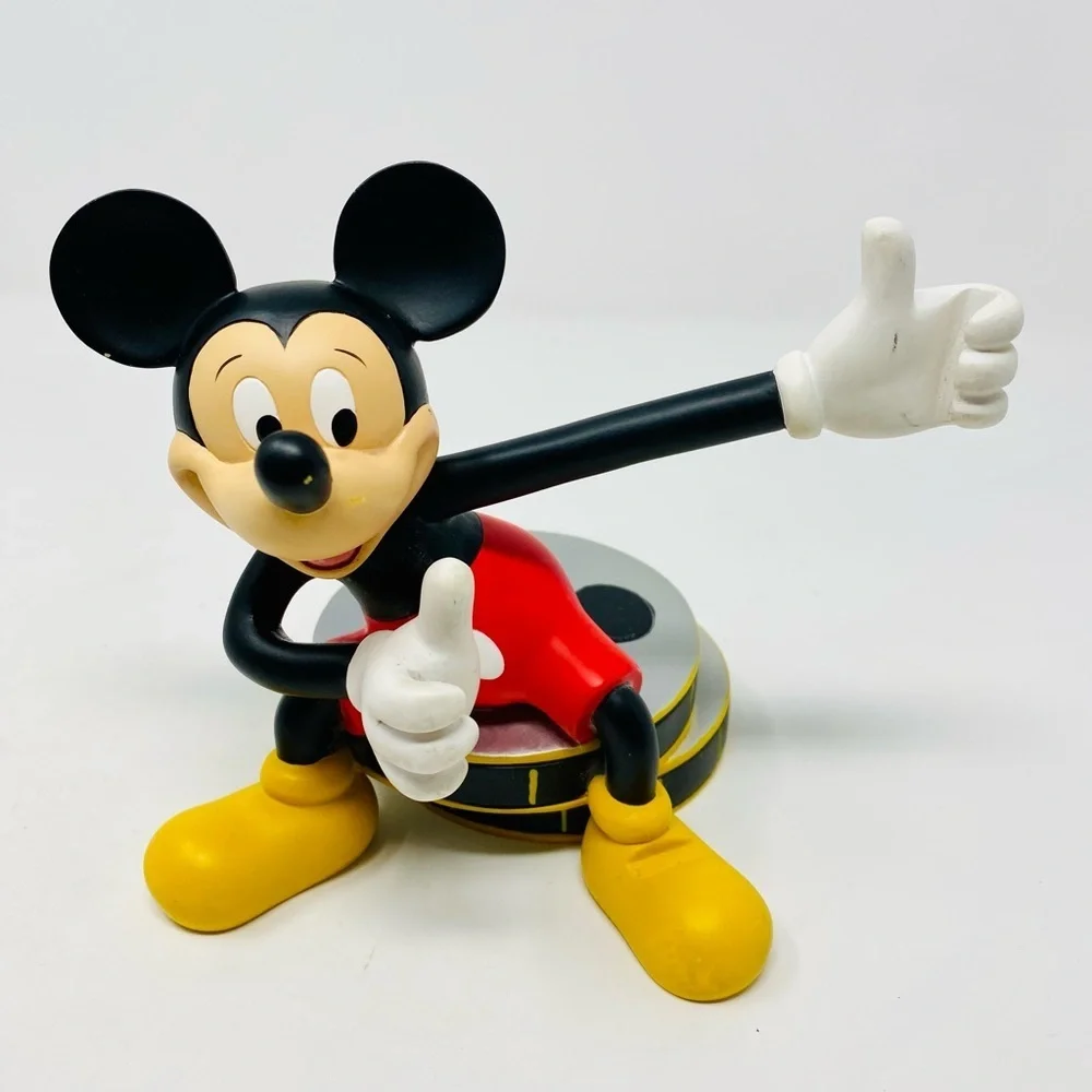 VINTAGE DISNEY, OVERLAND PARK KS66214 MICKEY SITTING ON FILM REELS